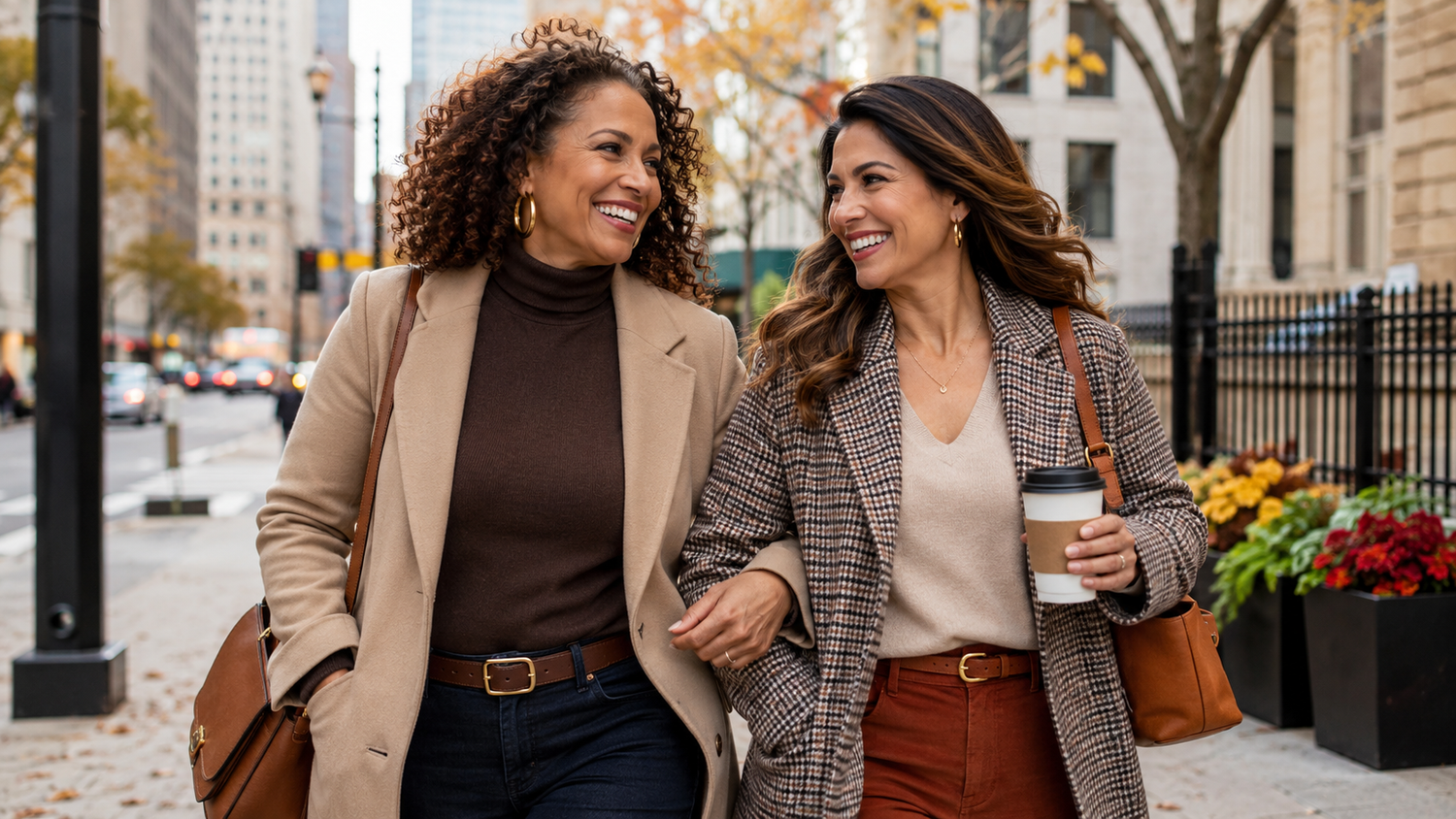 2 women smiling on the street